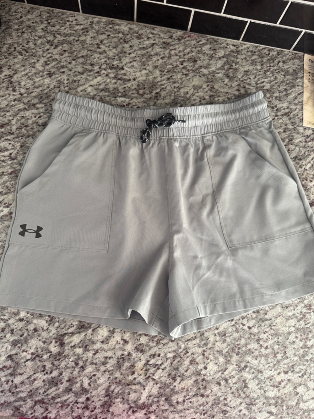 Under Armour girls light green Performance Athletic Shorts